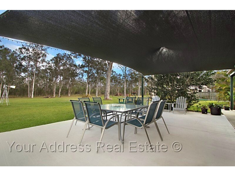 100 Merluna Road, Park Ridge South QLD 4125