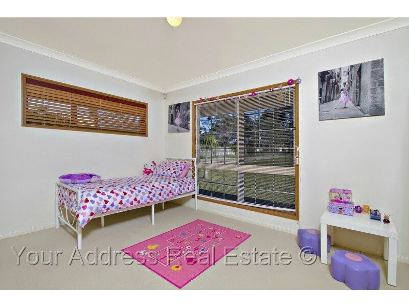 100 Merluna Road, Park Ridge South QLD 4125