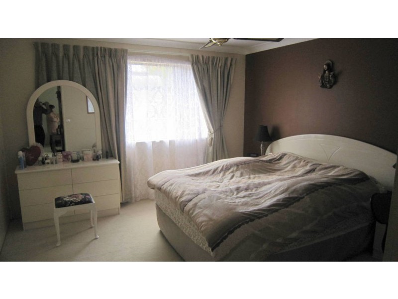 57 Warner Ave, Tuggerawong NSW 2259