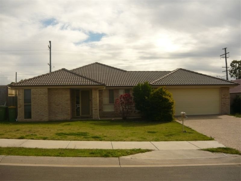 1 Tea Tree Place, Raceview QLD 4305