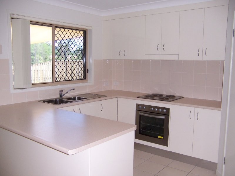 9 Burr Court, Pacific Pines QLD 4211