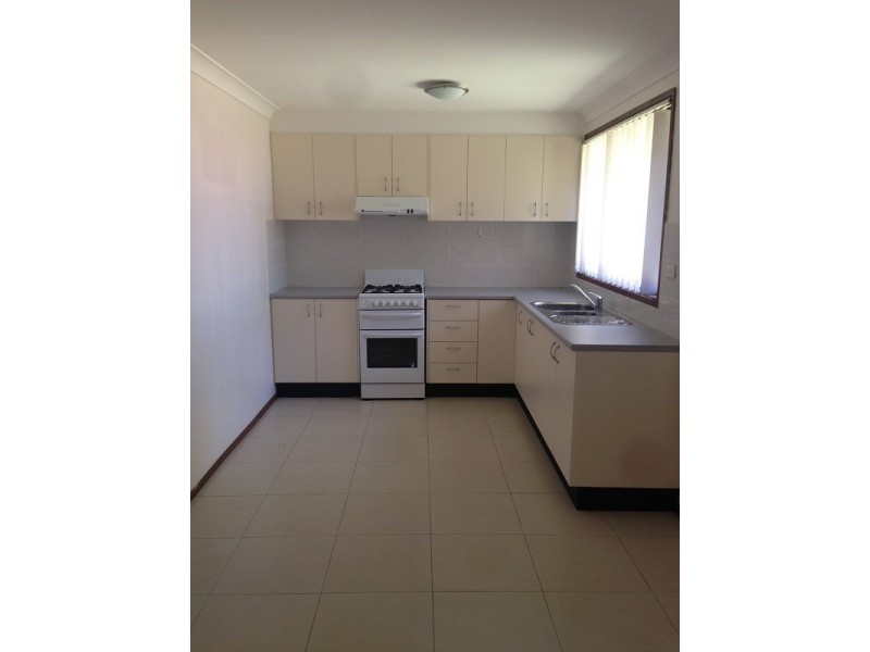 9 Pelargonium Place, Macquarie Fields NSW 2564