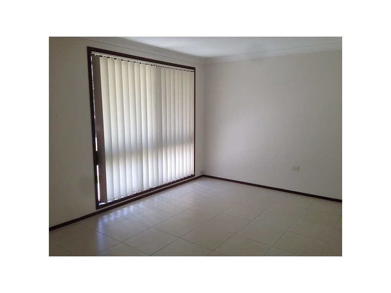 9 Pelargonium Place, Macquarie Fields NSW 2564