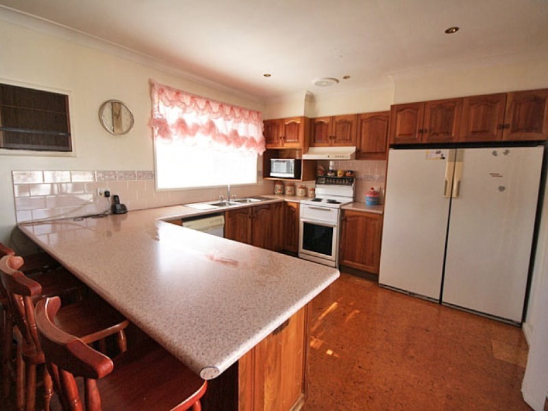 15 Wattle Street, Macquarie Fields NSW 2564