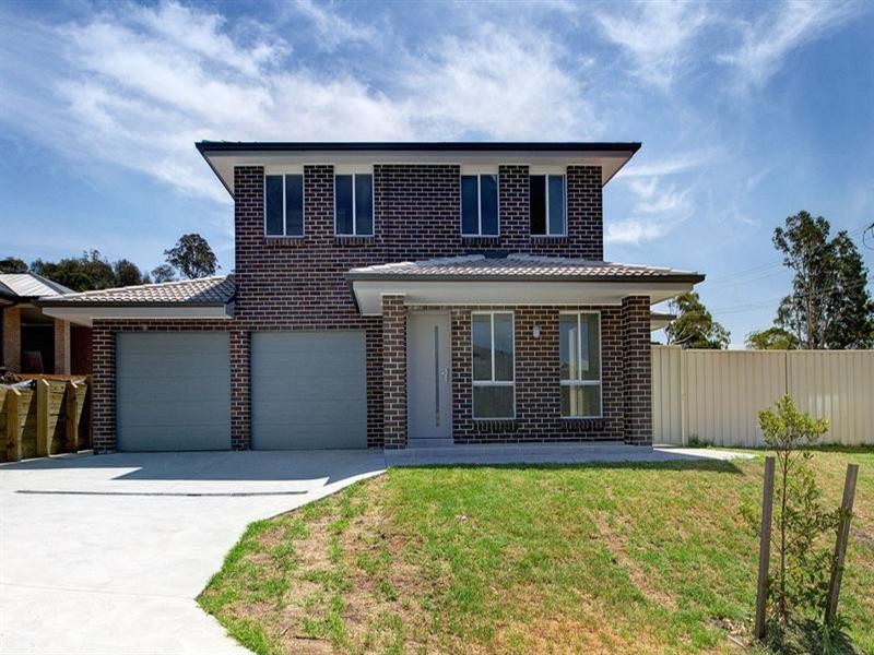 2 Pinnacle Way, Koonawarra NSW 2530