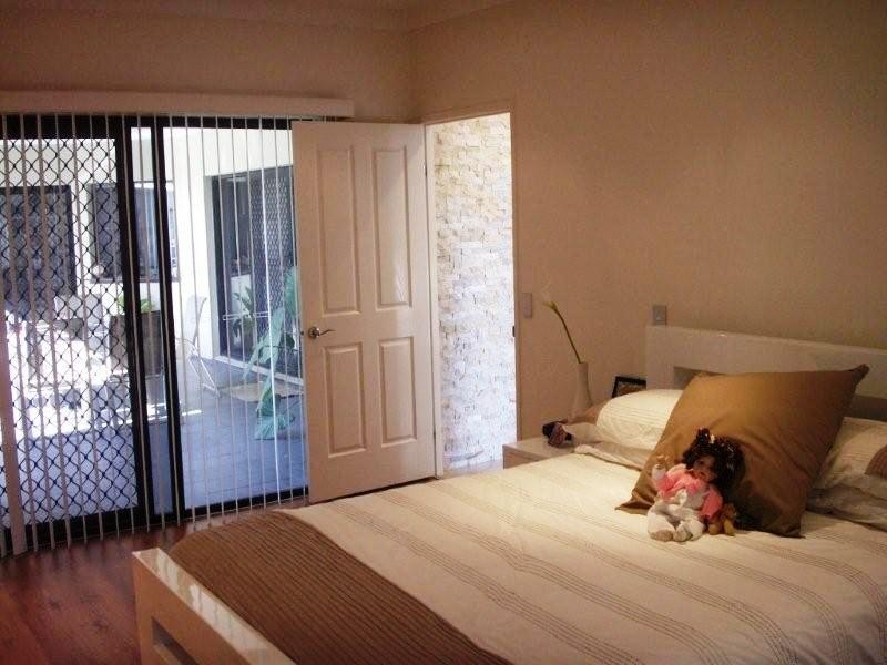 9 Pritchard Court, Pacific Pines QLD 4211