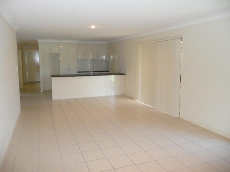 9 Taske Rise, Pacific Pines QLD 4211