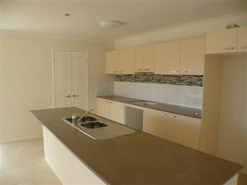 13 Farraday Crescent, Pacific Pines QLD 4211