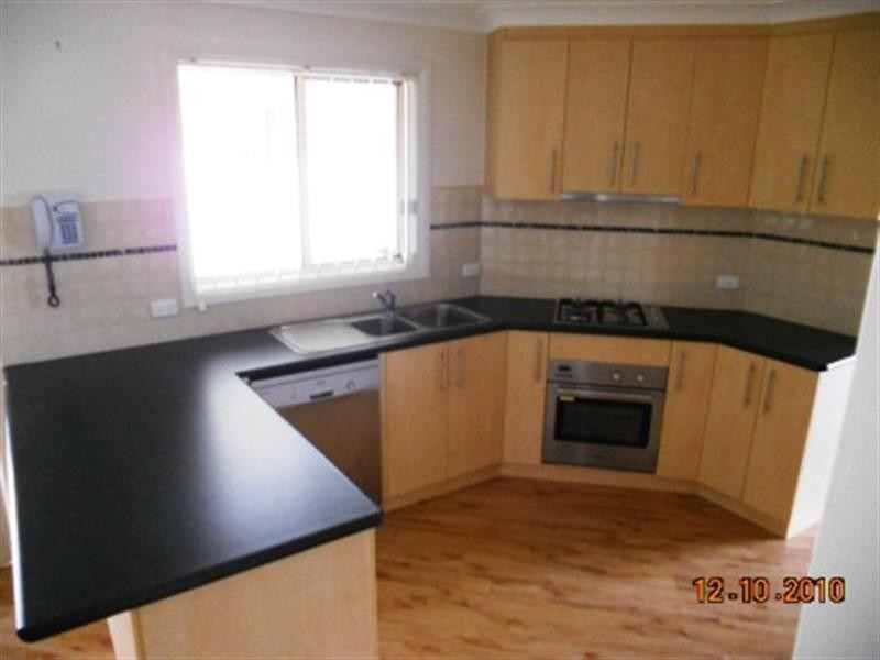 7 Womboin Crescent, Glenfield Park NSW 2650