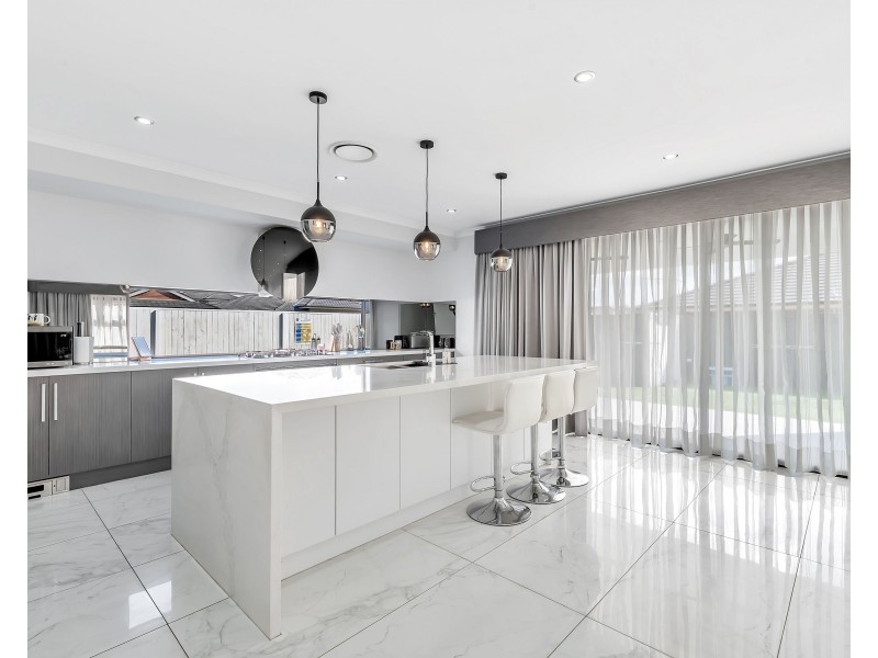 25 Savery Road, Carnes Hill NSW 2171