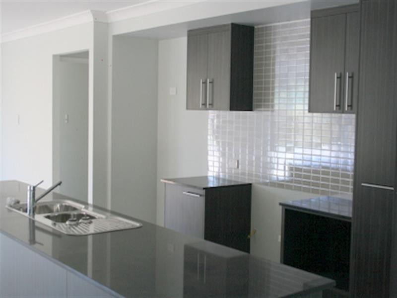 On Ambrose Drive, Augustine Heights QLD 4300