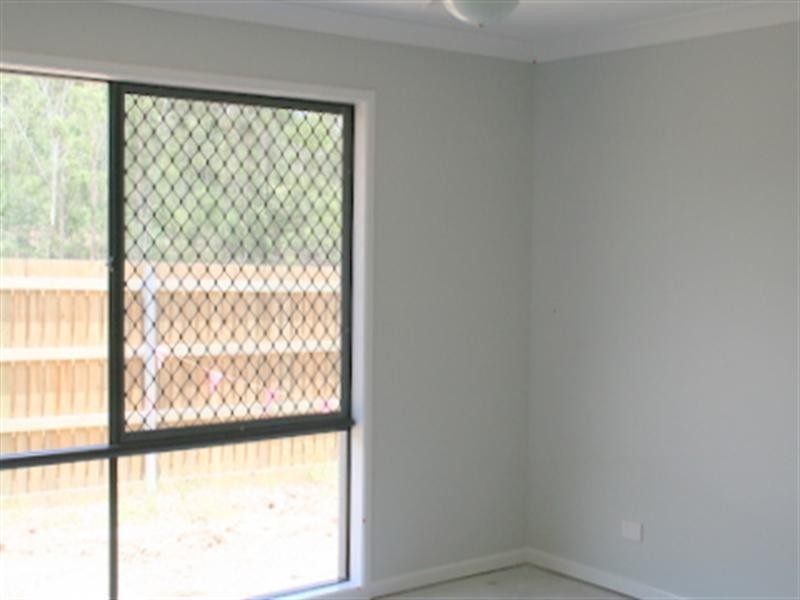 On Ambrose Drive, Augustine Heights QLD 4300