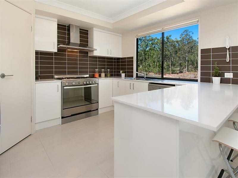 On Ambrose Drive, Augustine Heights QLD 4300