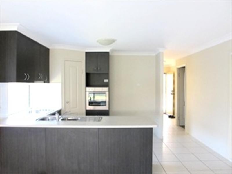 On Cardena Drive, Augustine Heights QLD 4300