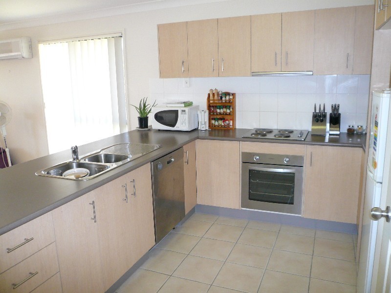 13 Stockdale Street, Pacific Pines QLD 4211