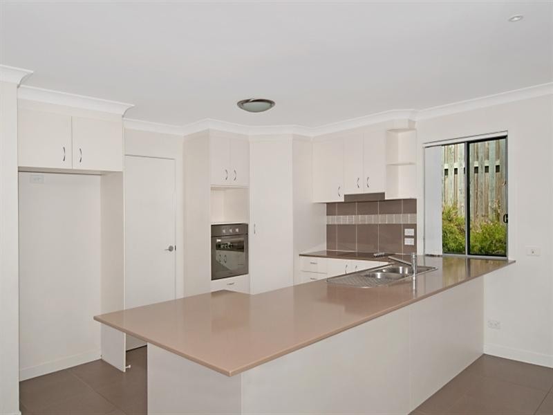 54 Harmsworth Road, Pacific Pines QLD 4211