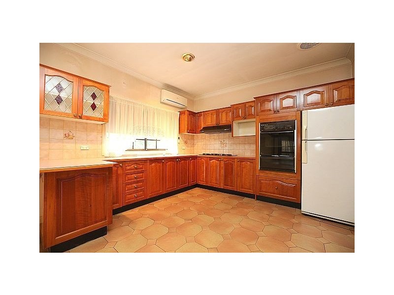 228 Henry Lawson Drive, Georges Hall NSW 2198