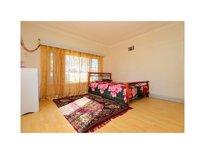 242 Henry Lawson Drive, Georges Hall NSW 2198
