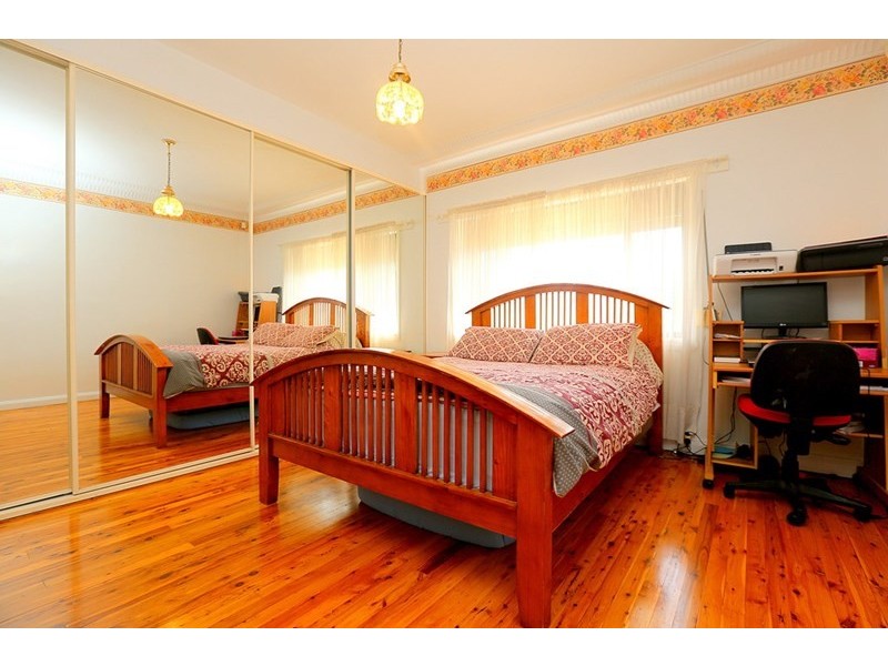 215 Henry Lawson Drive, Georges Hall NSW 2198