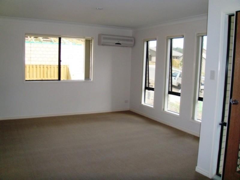 15 Chesterton Street, Pacific Pines QLD 4211