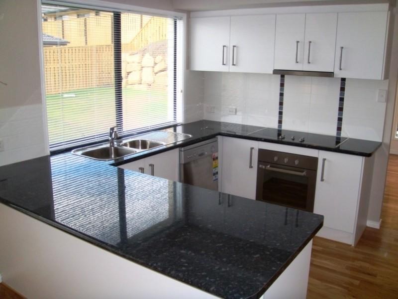 15 Chesterton Court, Pacific Pines QLD 4211