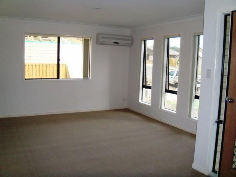 15 Chesterton Court, Pacific Pines QLD 4211