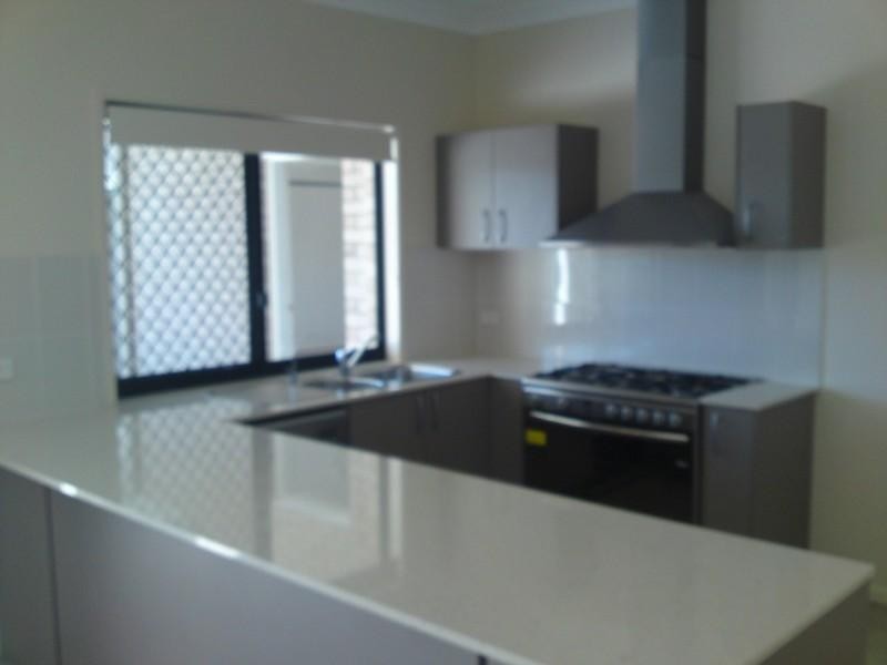 10 McAuley Parade, Pacific Pines QLD 4211