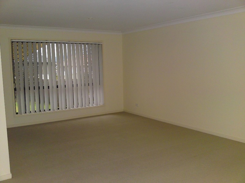 7 Arragan Court, Pacific Pines QLD 4211