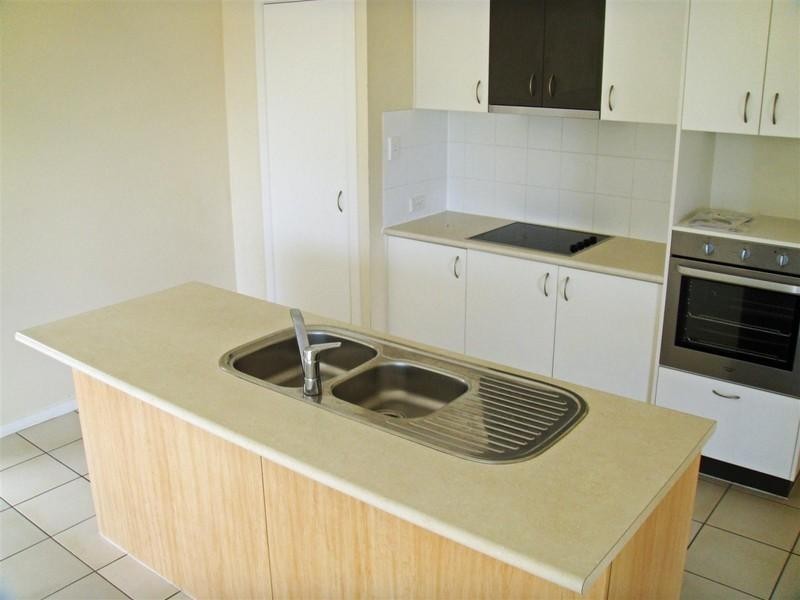 12 Norfolk Drive, Pacific Pines QLD 4211