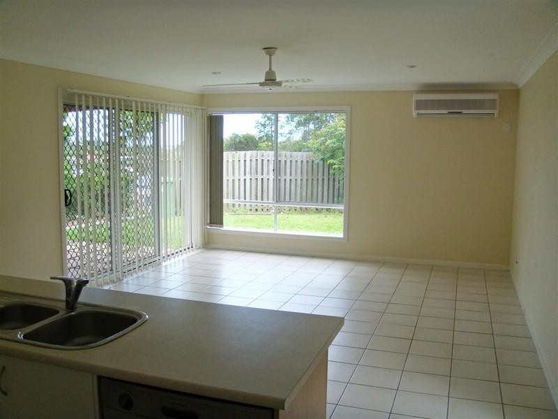 12 Norfolk Drive, Pacific Pines QLD 4211