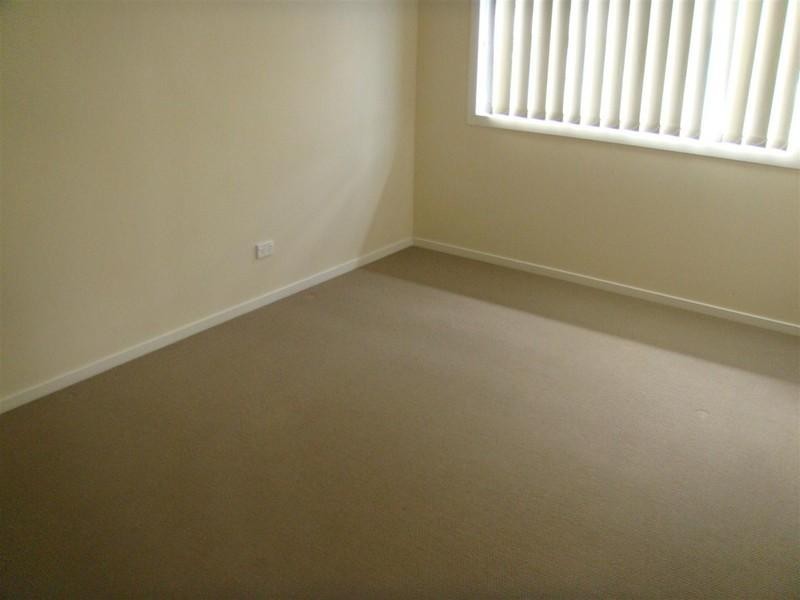 12 Norfolk Drive, Pacific Pines QLD 4211