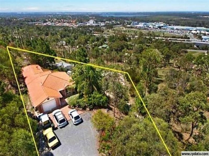 15 High Ridge Road, Pacific Pines QLD 4211