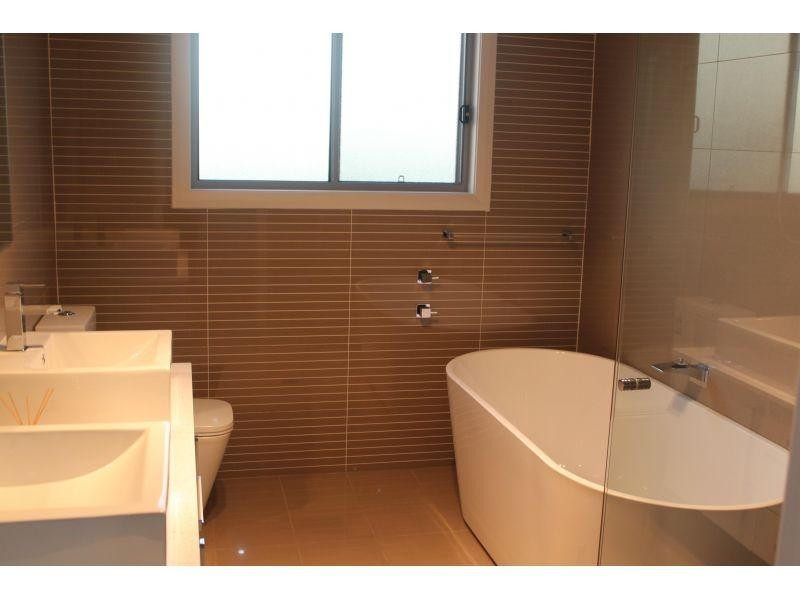 64 Whimbrel Avenue, Lake Heights NSW 2502