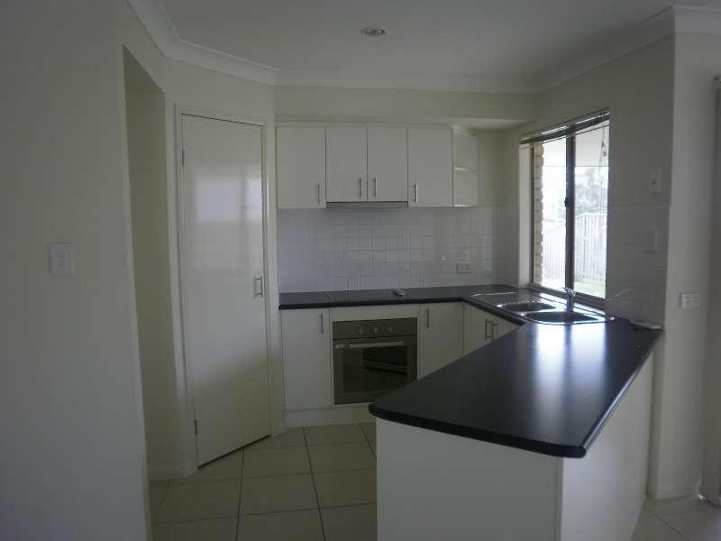 7 Starkey Street, Pacific Pines QLD 4211