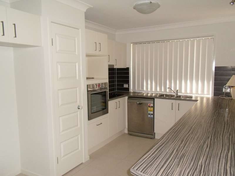 14 Faraday Crescent, Pacific Pines QLD 4211