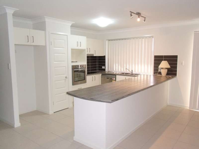 14 Faraday Crescent, Pacific Pines QLD 4211