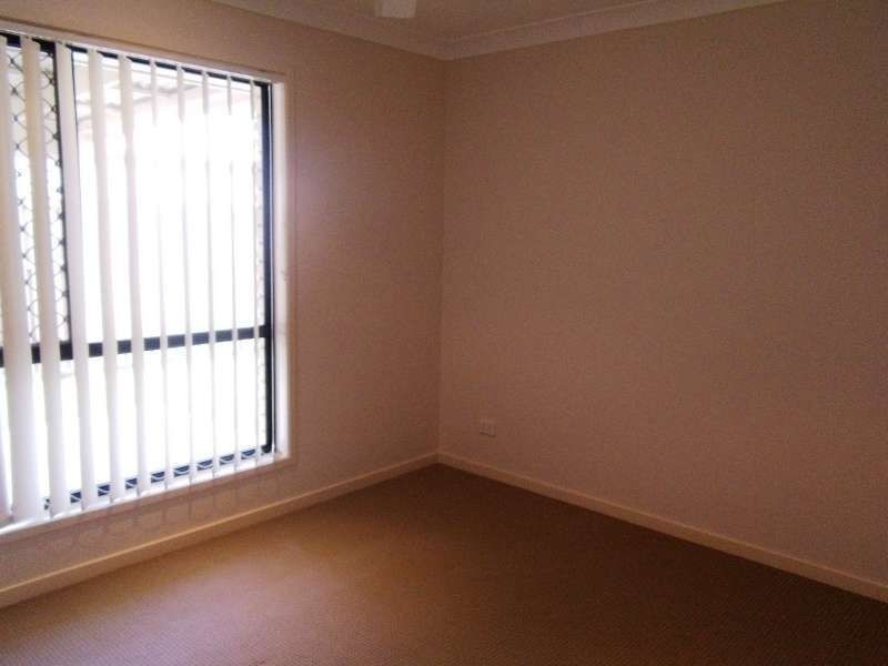 4 Gerard Street, Pacific Pines QLD 4211