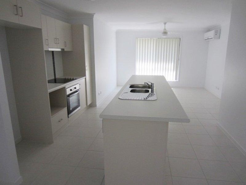 6 Wineglass Bay Avenue, Mount Low QLD 4818